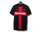Maillot Bayer Leverkusen VAPOR domicile 2023/2024 noir et rouge avec croix rouge sur la poitrine et sponsor Barmenia, version authentique, vue de face.